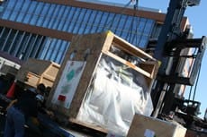Workers ready the MRI machine to be installed at the Psychiatric Research Institute. 