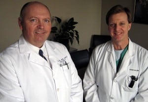Chuck Hitt, M.D., (left) and Gordon Low, an advanced practice nurse, are leading a telecolposcopy program to help rural Arkansas women.