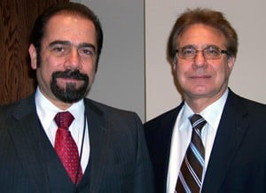 Rasco Symposium course director Issam Makhoul, M.D., (left) with Robert Bresalier, M.D., of MD Anderson Cancer Center in Houston.