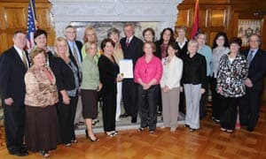 Arkansas Gov. Mike Beebe and Arkansas Coalition for Nursing Home Excellence members celebrate a proclamation that declared May 10-14 Advancing Excellence in Nursing Home Week. 