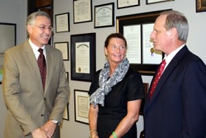 UAMS Chancellor Dan Rahn visits with College of Nursing Dean Claudia Barone and C. Edward Keller of the Beaumont Foundation of America.