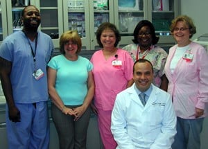 Mohamed Kamel, M.D., (seated) and his team from the UAMS Department of Urology Oncology will offer free prostate cancer screenings. The team includes (L-R) Courtney Warren; Paula A. Brown; Sharon Spencer, R.N.; Tamara Bell; and Doris Nichols, R.N.