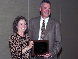 Michele Moss, M.D., received the Distinguished Career Award from Don Vernon, M.D., Chair of the Section on Critical Care of the American Academy of Pediatrics.