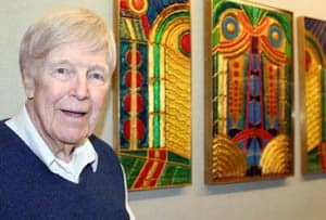 Mike Butner, 86, says UAMS physical therapists keep him in shape to create his original 3-D art panels. 