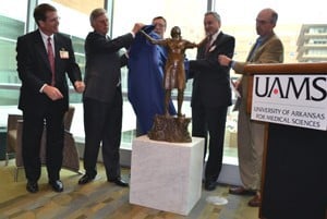 (l-r) Peter Emanuel, Gov. Mike Beebe, Michael Warrick, Dan Rahn and Bob Johnson unveil the sculpture dedicated to the memory of the late Sen. Jerry Bookout. 