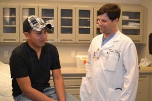 Gustavo Osario avoided an open incision surgery thanks to UAMS’ Matthew Katz, M.D., who used a minimally invasive approach.  