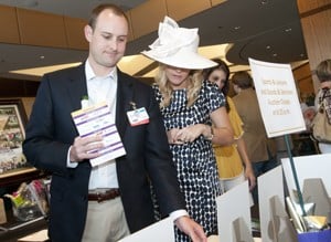 David and Korie Trice, members of the UAMS Consortium, browse auction items. 
