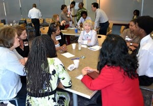 Small groups talk during first meeting of Community Engagement/Health Disparities Research Interest Group.