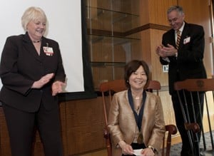 Debra Fiser and Dan Rahn celebrated the investiture of Jeanne Wei (center).