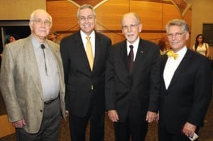 (From left) Founding Dean Tip Nelms, Chancellor Dan Rahn, Dean Emeritus Ronald Winters and Dean Douglas Murphy pose during the college's 40th anniversary celebration.