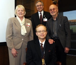 Fiser, Chancellor Dan Rahn and Barlogie pose with van Rhee (seated).