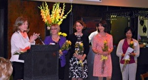 Finalists for the award included (from left next to podium): Gaddy, Laura Lamps, M.D., Laurie Barber, M.D., and Sara Tariq, M.D. Not pictured is Suzanne Klimberg, M.D.