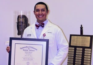 Aaron Ricca celebrates winning the 2012  Dr. Horace N. Marvin Award for achieving the highest numerical score in his freshman medical microscopic anatomy course at UAMS.