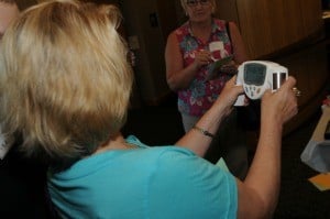 Clinic employees helped patients and guests check their BMI and body fat measurements. 