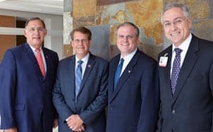 U.S. Sen. John Boozman; Cancer Institute Director Peter Emanuel, M.D.; U.S. Sen. Mark Pryor; and UAMS Chancellor Dan Rahn, M.D. attend the cancer labs opening.