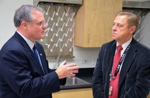 U.S. Sen. Mark Pryor speaks with UAMS cancer researcher Vladimir Zharov, Ph.D., during a lab tour.