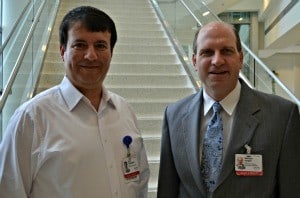 Researchers Umit Topaloglu, Ph.D., (left) and William Hogan, M.D., developed software selected for use in the National Children's Study.