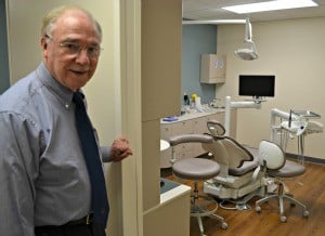 Charles O. Cranford, D.D.S., director of the UAMS Center for Dental Education, shows one of the clinic treatment rooms.