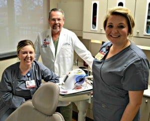UAMS Oral Health Clinic staff members (from left) dental hygienist Toshua Thomas, Keith David Stillwell, D.D.S., and dental assistant Tiffany London will see patients in the clinic that opened Jan. 28, providing comprehensive dental care. The clinic is on the first floor of the Shorey Building, adjacent to the dental hygiene clinic. 