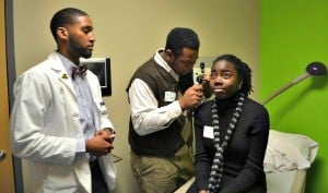 Students from every UAMS college volunteered to host visiting high school students and give them tours of the campus and the chance to participate in hands-on exercises, such as taking a patient history from one another in the clinical skills lab.