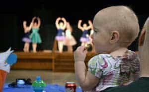 Elizabeth Miley and her mother, Kendra, of Clinton, enjoy one of several dance numbers at the second annual UAMS NICU reunion. 