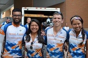 Cyclists (from left) Jawaid Ali, Kayla Cruz, Daniel van Dongen and Quynh Pham pose during a brief stop at the UAMS Cancer Institute.