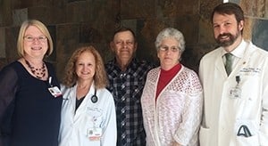 After being diagnosed with lung cancer, Herla and Sharon Mullins (third and fourth from left) underwent successful treatment and quit smoking. They are shown with certified tobacco treatment specialists (from left) Erna Boone, Dr.P.H.; Pat Franklin, A.P.R.N.; and thoracic surgeon Matthew Steliga, M.D