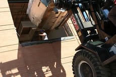 The new MRI machine is delivered through a hole in the side of the Psychiatric Research Institute.