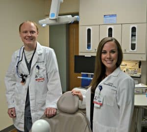 Michael Dienberg, D.D.S., (left) and Ashley McMillan, D.D.S., are the first two resident dentists in the UAMS Center for Dental Education.
