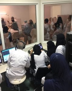 Michael Anders, Ph.D., (left) oversees the first simulation run at Princess Nora University in Saudi Arabia.