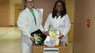 Students gather school supplies