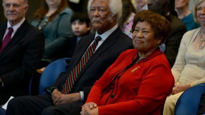 Former U.S. Surgeon General M. Joycelyn Elders, M.D., and her husband, Oliver "Coach" Elders, as seen in April 2015 for the unveiling of a commemorative portrait of Elders at UAMS.