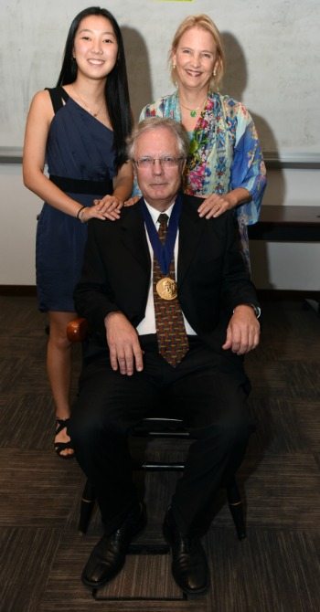 "None of this would be possible without my family," Hauer-Jensen said. Here he poses with his daughter, Miriam, and wife, Cynthia Ross.