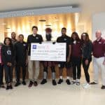 Group shot of check presentation
