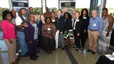 Community Scientist Academy graduates along with UAMS faculty and staff are (l-r): Camille Hart (staff), Charles Moore (back), Carl Farr, Sarah Facen, David Miller (back), Pat Kissire, Virginia Wilhelm, Nicki Spencer (staff), Willie Wade (back), Onie Norman, Larry Taylor, Marvin Hayenga (back), Sylvia Halliburton, Mary Aitken (faculty), Kate Stewart (faculty), Esther Dixon, David Robinson (staff) and Kimberly Moore. (Not pictured: Marilyn Bailey-Jefferson, Freeman McKindra, Suzanne Overgaard and Joy Rockenbach)