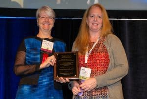 Carrie Chiaro (right) accepted the award on behalf of the SOCRA chapter during the group’s annual meeting in Montreal.