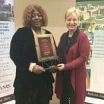Naomi Cottoms received the Chancellor’s Community Research Partner Award on behalf of her organization, Tri County Rural Health Network, from TRI Director Laura James, M.D.
