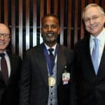 Rawle A. "Tony" Seupaul, M.D., (center) with UAMS Executive Vice Chancellor and College of Medicine Dean Pope L. Moseley, M.D., and Chancellor Dan Rahn, M.D.