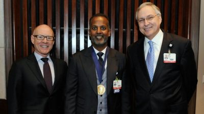 Rawle A. "Tony" Seupaul, M.D., (center) with UAMS Executive Vice Chancellor and College of Medicine Dean Pope L. Moseley, M.D., and Chancellor Dan Rahn, M.D.