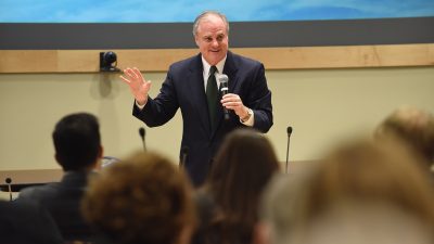 Pryor talking before audience