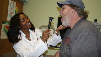 Doctor examines patient
