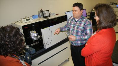 Professor pointing to features of mass spec