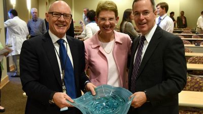 Three doctors with art bowl