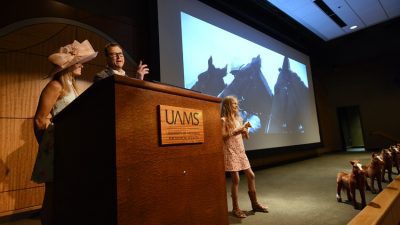 Alyson Courtney and Wess Moore served as emcees, with their 8-year-old daughter, Berkeley, announcing the winner of the hat contest.