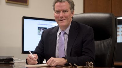 Dr. Barr at desk