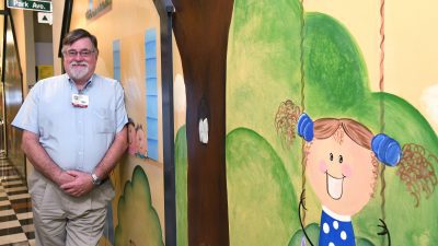 Dr. Schulz by mural