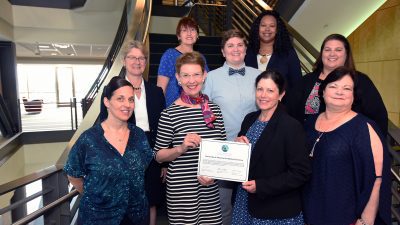 Group photo with accreditation