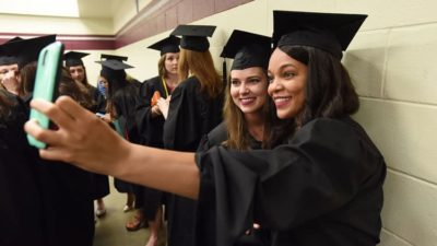 Graduates taking selfie