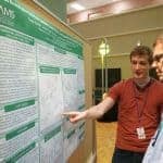 Dustyn Barnette, a third-year graduate student, discusses his research with Jason Stumhofer, Ph.D.