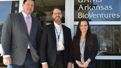 Rejuvenix CEO Joshua Phillips, left, Jay Gandy, Ph.D., and Amanda Stolarz, Pharm.D., Ph.D., Rejuvenix Technologies chief science officer, stop outside the offices of BioVentures before meeting with BioVentures director Nancy Gray, Ph.D.
